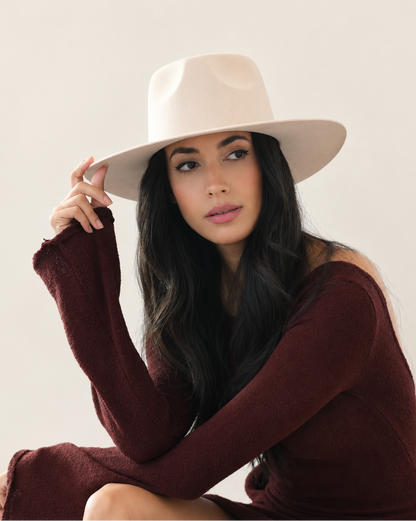 Model wearing Sable Wool Fedora Hat in Birch with burgundy dress