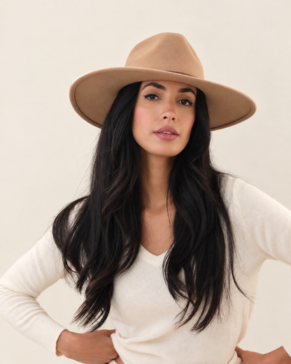 Front view of model wearing Chestnut Aspen wide-brim wool fedora with white top