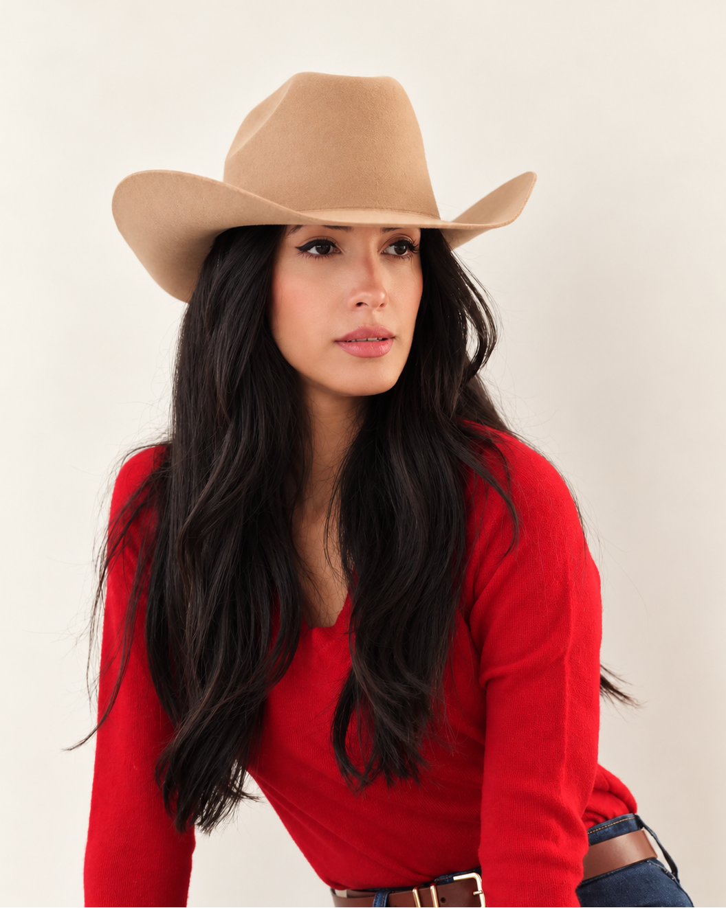 Model wearing Chestnut brown Clayton Wool Cowboy Hat with red long-sleeve top