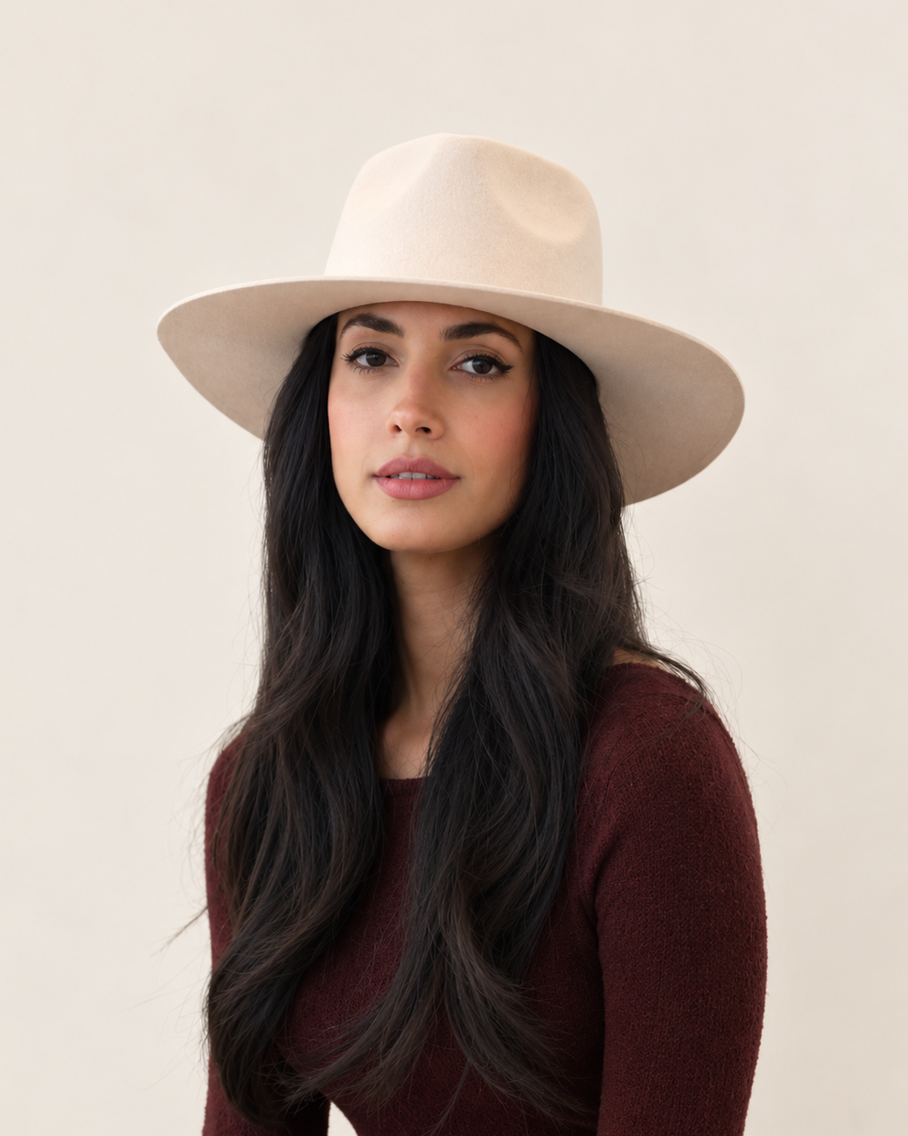Front view of Sable Wool Fedora Hat in Birch styled with burgundy knitwear