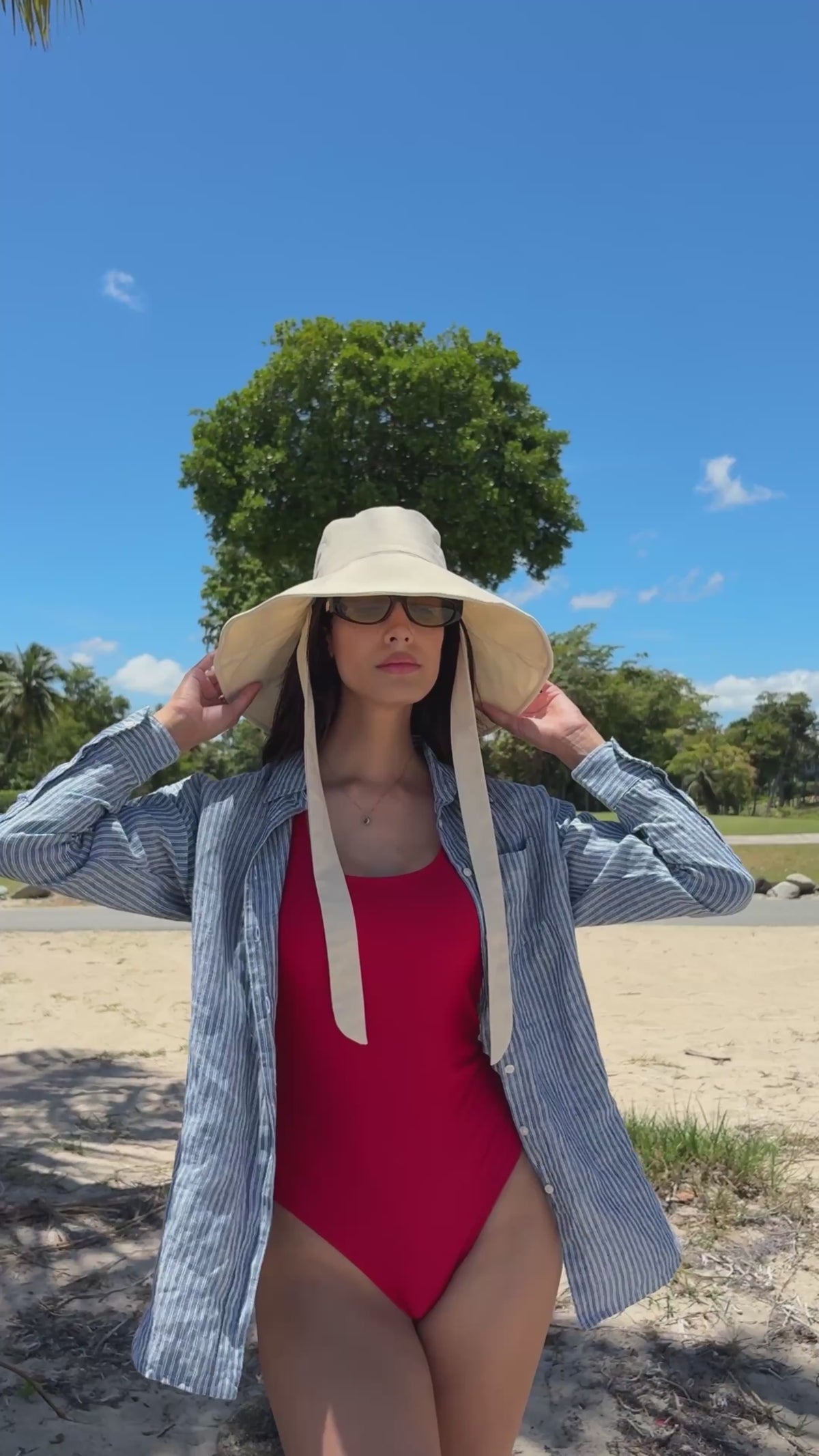 Coast Cream bucket hat styled outdoors with fabric ties